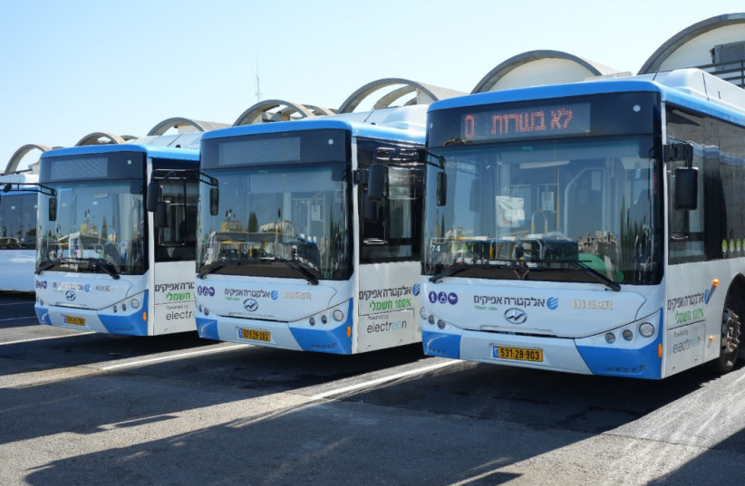Electra Afikim's lineup of electric buses; Israel's first wireless charging electric bus depot. (photo credit: Alexey Izmalkov)