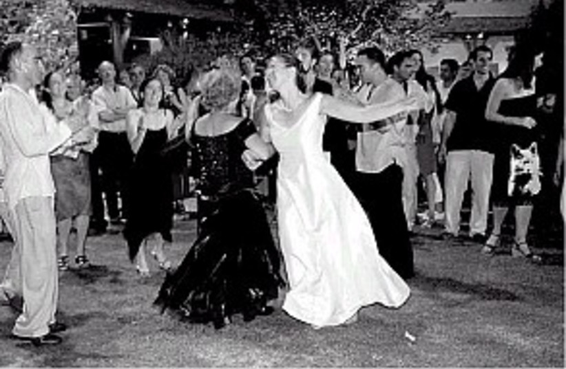 dancing bride 298.88 (photo credit: Ariel Jerozolimski)