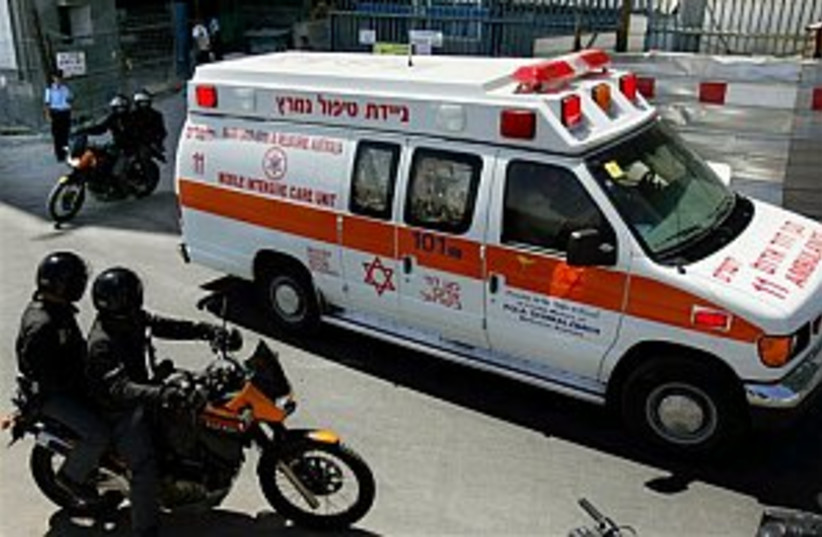 sharon ambulance 298 ap (photo credit: AP)