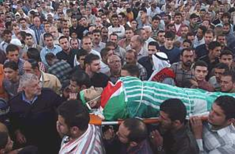 dead palestinian 298.88 (photo credit: AP)