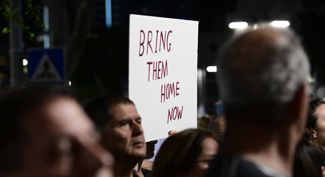  Israelis attend a rally calling for the release of Israelis held kidnapped by Hamas terrorists in Gaza outside the Defense Ministry Headquarters in Tel Aviv, November 4, 2023 (photo credit: TOMER NEUBERG/FLASH90)