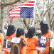 DEMONSTRATORS IN prison jumpsuits and black hoods call for the closure of the Guantanamo Bay detention camp, in a protest near the White House in January. 