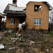 Vitalii Zhyvotovskyi, 50, walks outside his house that he told Reuters was destroyed by Russian troops as they were retreating from Bucha, in Bucha, Kyiv region, Ukraine, April 19, 2022.