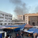  Smoke rises as displaced Palestinians take shelter at Al Shifa hospital, amid the ongoing conflict between Hamas and Israel, in Gaza City, November 8, 2023.