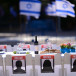  Families of Israelis held hostage by Hamas militants in Gaza set a symbolic shabbat table with more than 200 empty seats for the hostages, at  "Hostage Square", outside the Art Museum of Tel Aviv, October 20, 2023. 