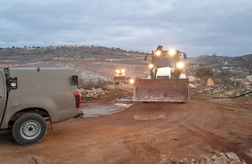 Border police forces on their way to the Kumi Ori outpost on the outskirts of the Yitzhar settlement to demolish two illegally built homes on January 15, 2020. (photo credit: Courtesy)