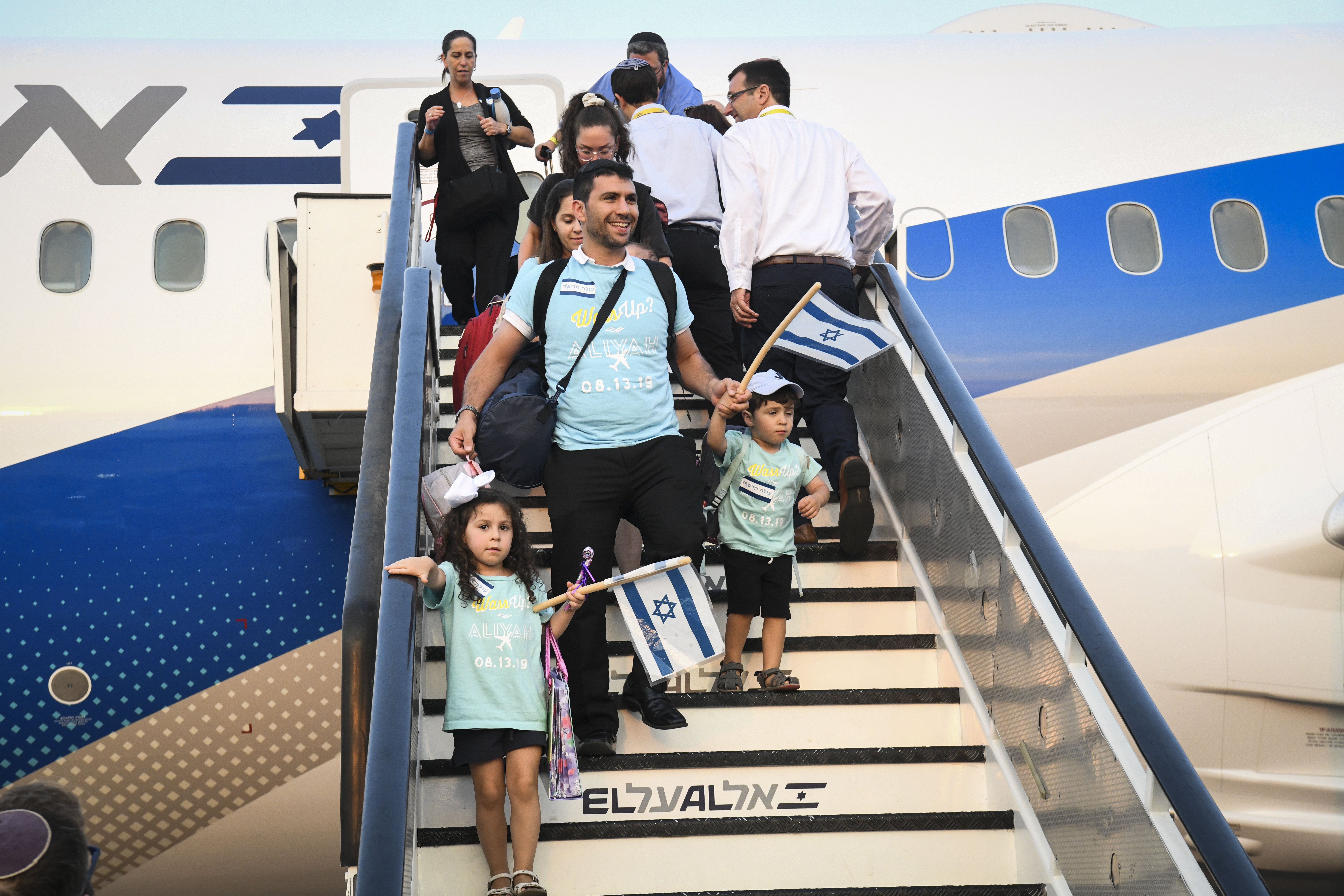 New immigrants arrive on a special ''Aliyah Flight'' at Ben-Gurion Airport, August 14, 2019; illustrative.