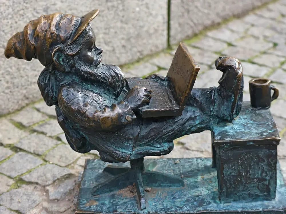 One of the 600 tiny dwarf statues scattered throughout the city