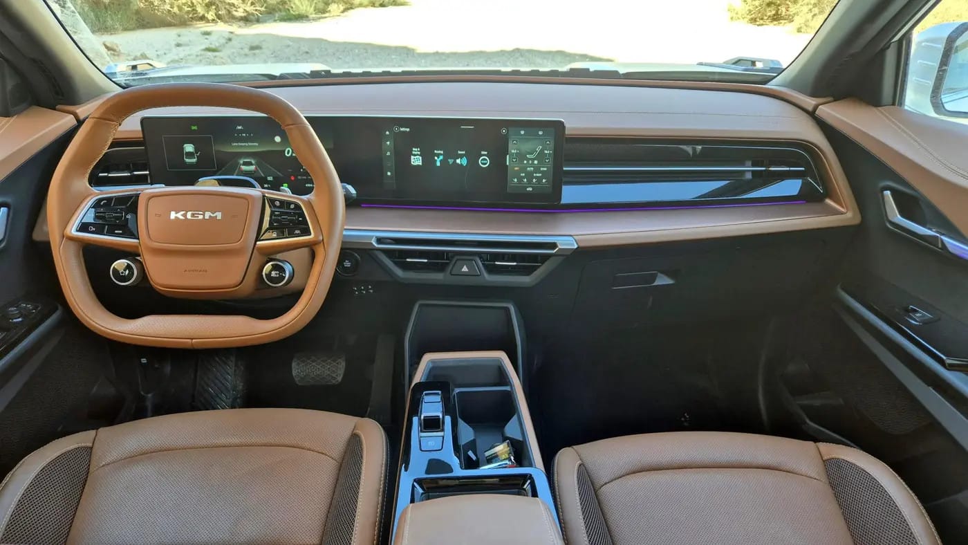 The steering wheel is unusual, but you get used to it. There is limited storage space.