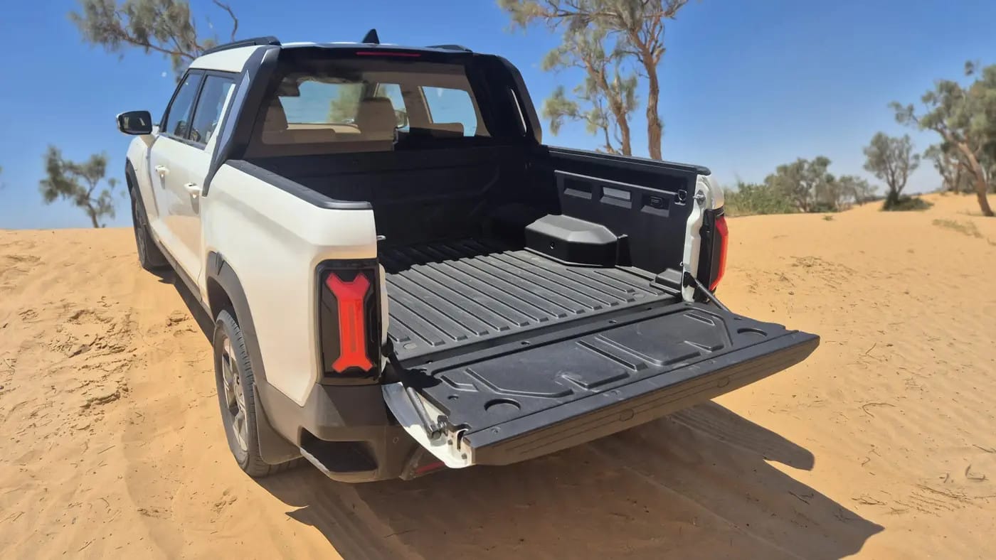 We liked the built-in step at the corner of the bumper, and the tie-down hooks installed inside the cargo bed.