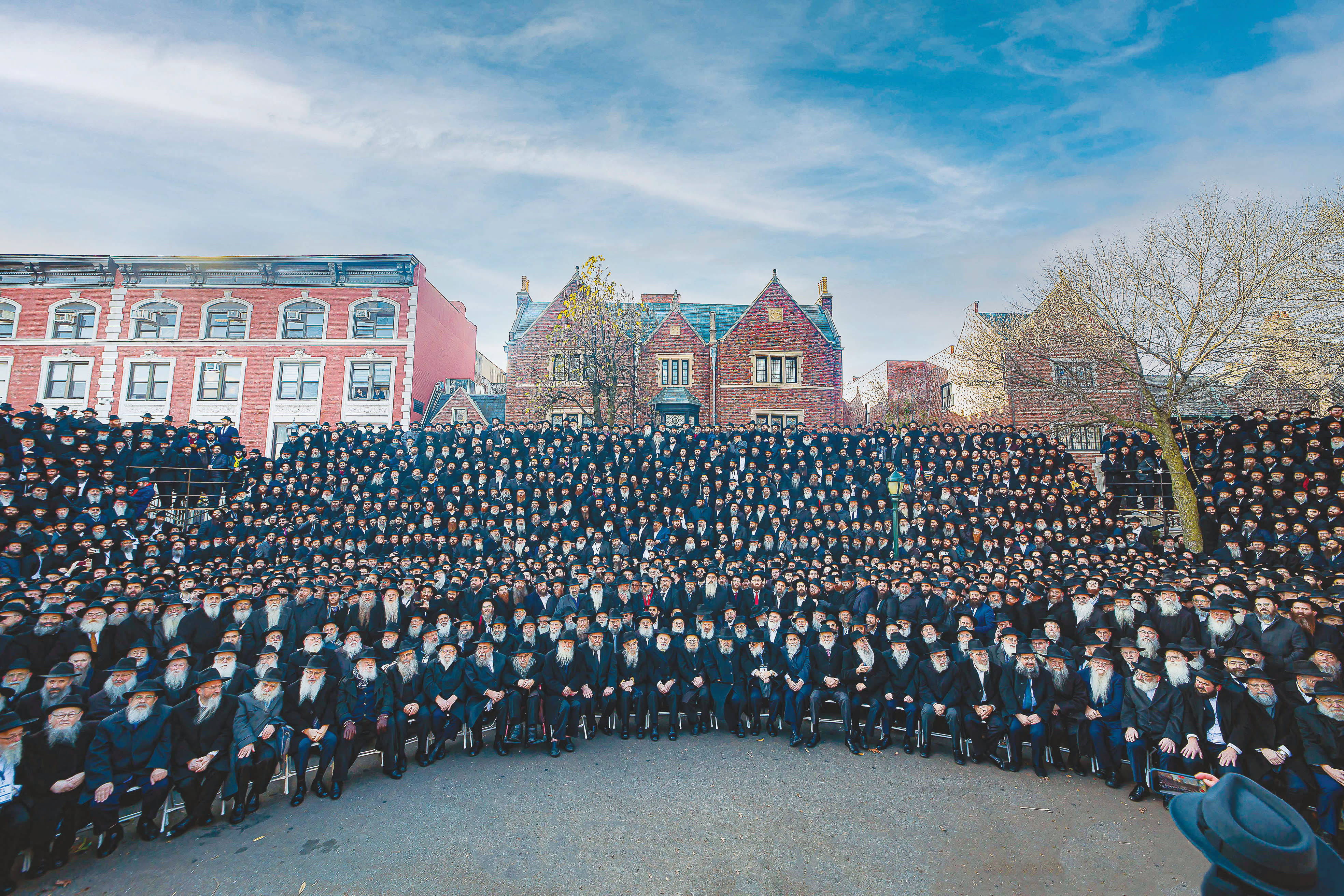 CHABAD ‘SHLUCHIM’ gather in front of 770 Eastern Parkway, New York, in 2022.