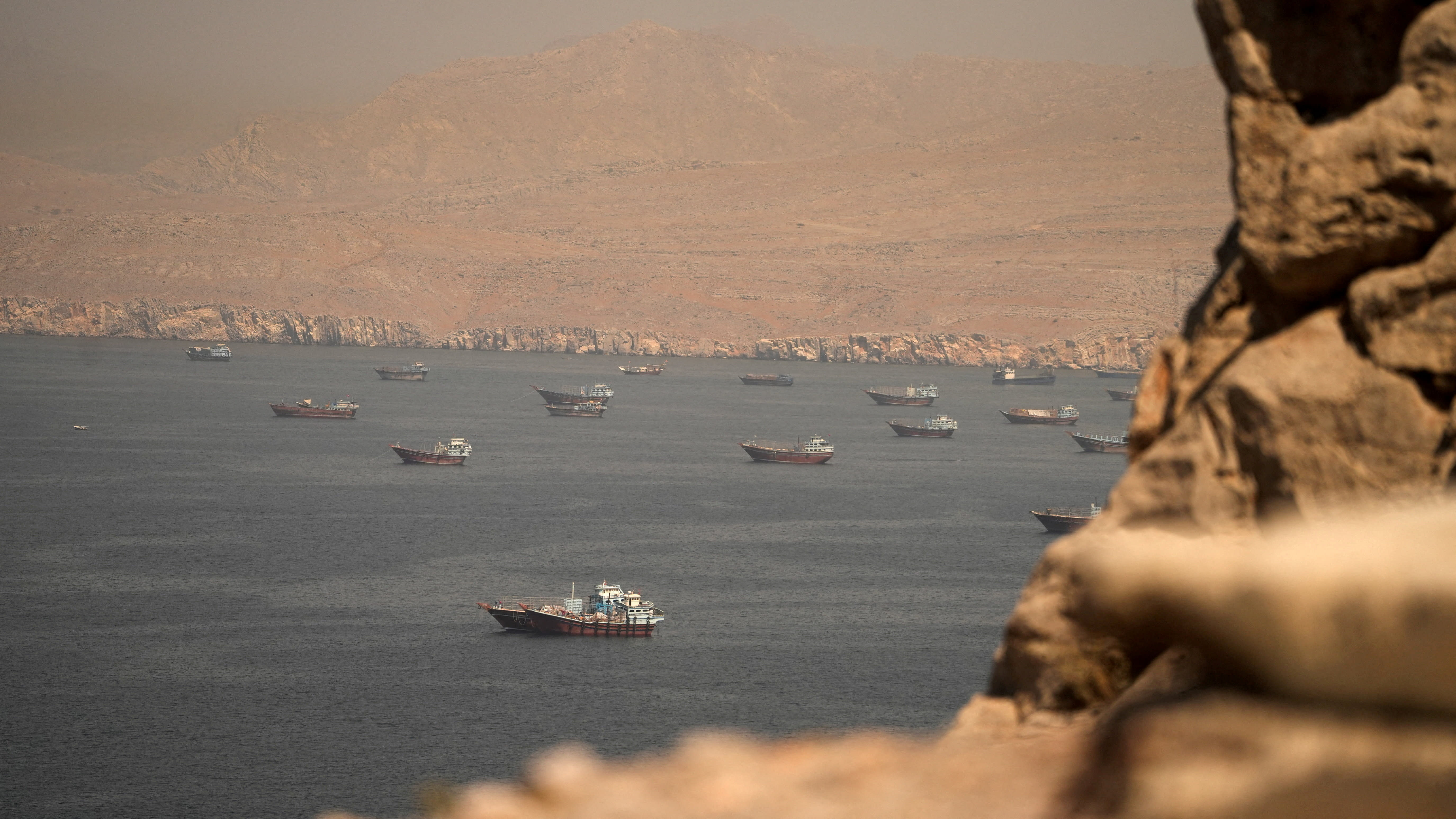 Vessels at the Strait of Hormuz, as seen from Musandam, Oman, June 18, 2026.
