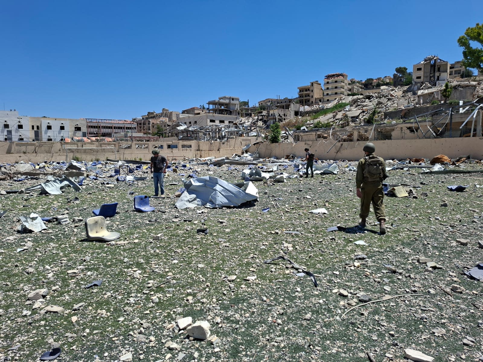 IDF soldiers walk through the Bint Jbail stadium, southern Lebanon, July 15, 2026.
