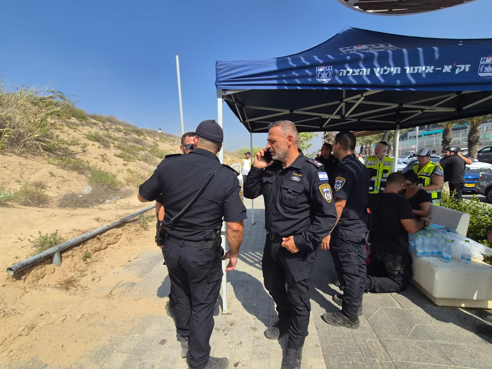 Israel Police officers conduct search for a missing child near Hofit Beach, Ashkelon, July 23, 2026.