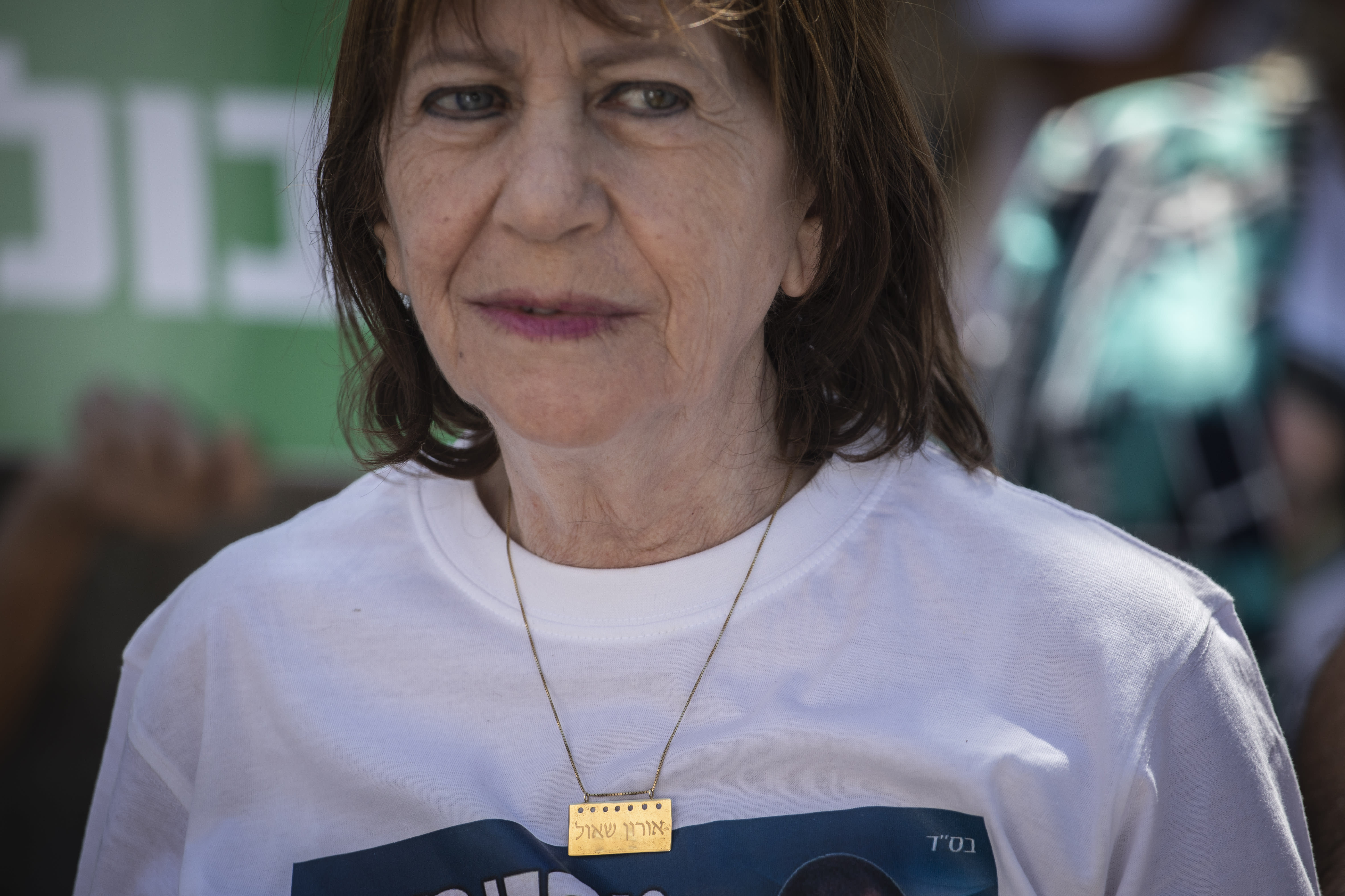 Zehava Shaul, mother of Oron Shaul, with supporters and family members of missing Israeli soldiers Oron Shaul and Hadar Goldin hold a protest outside the residence of Prime Minister Benjamin Netanyahu, on August 9, 2019.