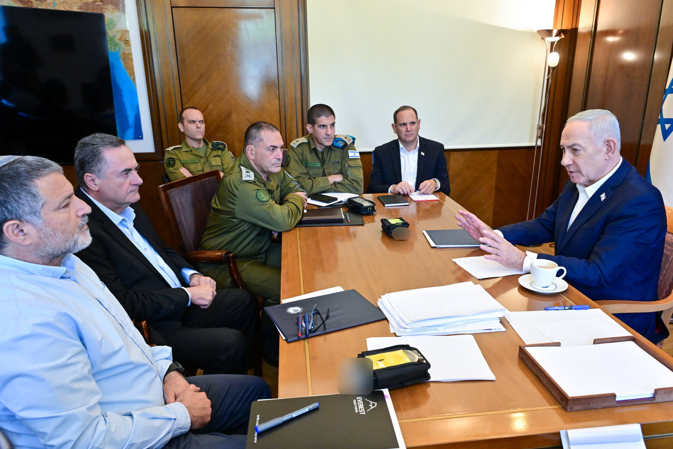 (From R-L) Prime Minister Benjamin Netanyahu, National Security Council head Shmuel Ben-Ezra, military secretary Maj.-Gen. Guy Markizeno, IDF chief Lt.-Gen. Eyal Zamir, IDF Intelligence head Maj.-Gen. Shlomi Binder, Defense Minister Israel Katz, and Shin Bet head David Zini consult, July 24, 2026.