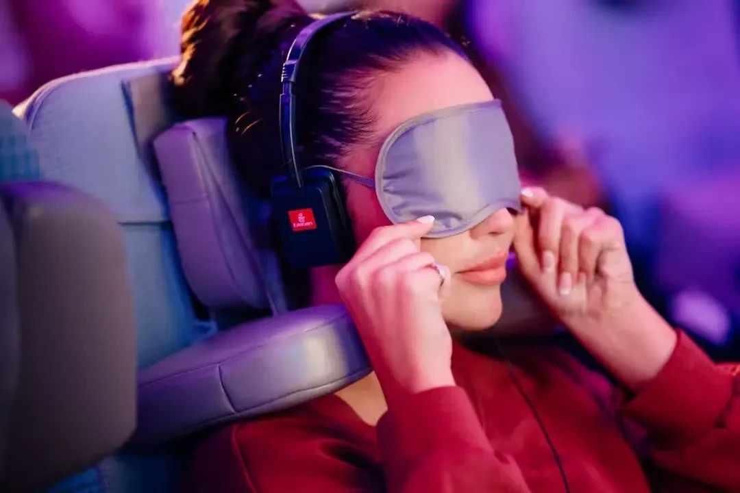 An 8-way adjustable headrest. The new Emirates seatback