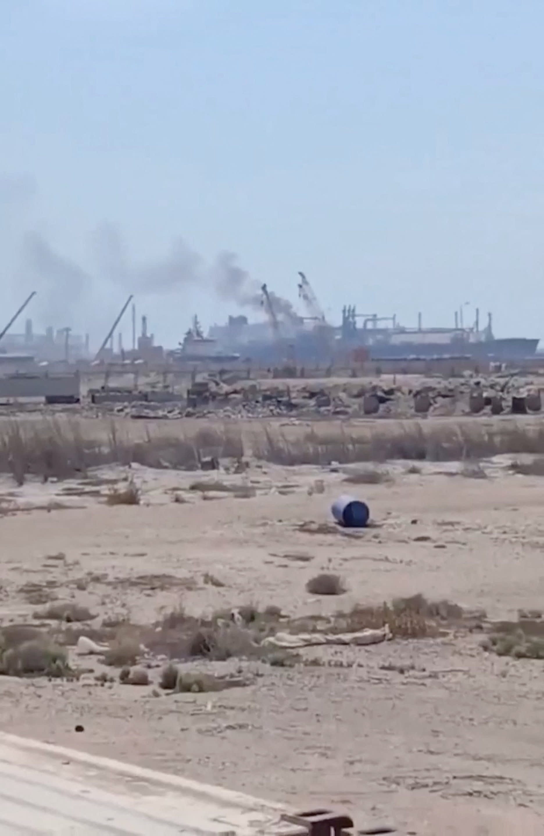 Smoke rises from a gas tanker after a drone strike, maritime security firm Ambrey said, at Damietta port, Egypt, July 29, 2026, in this screengrab obtained from a social media video.