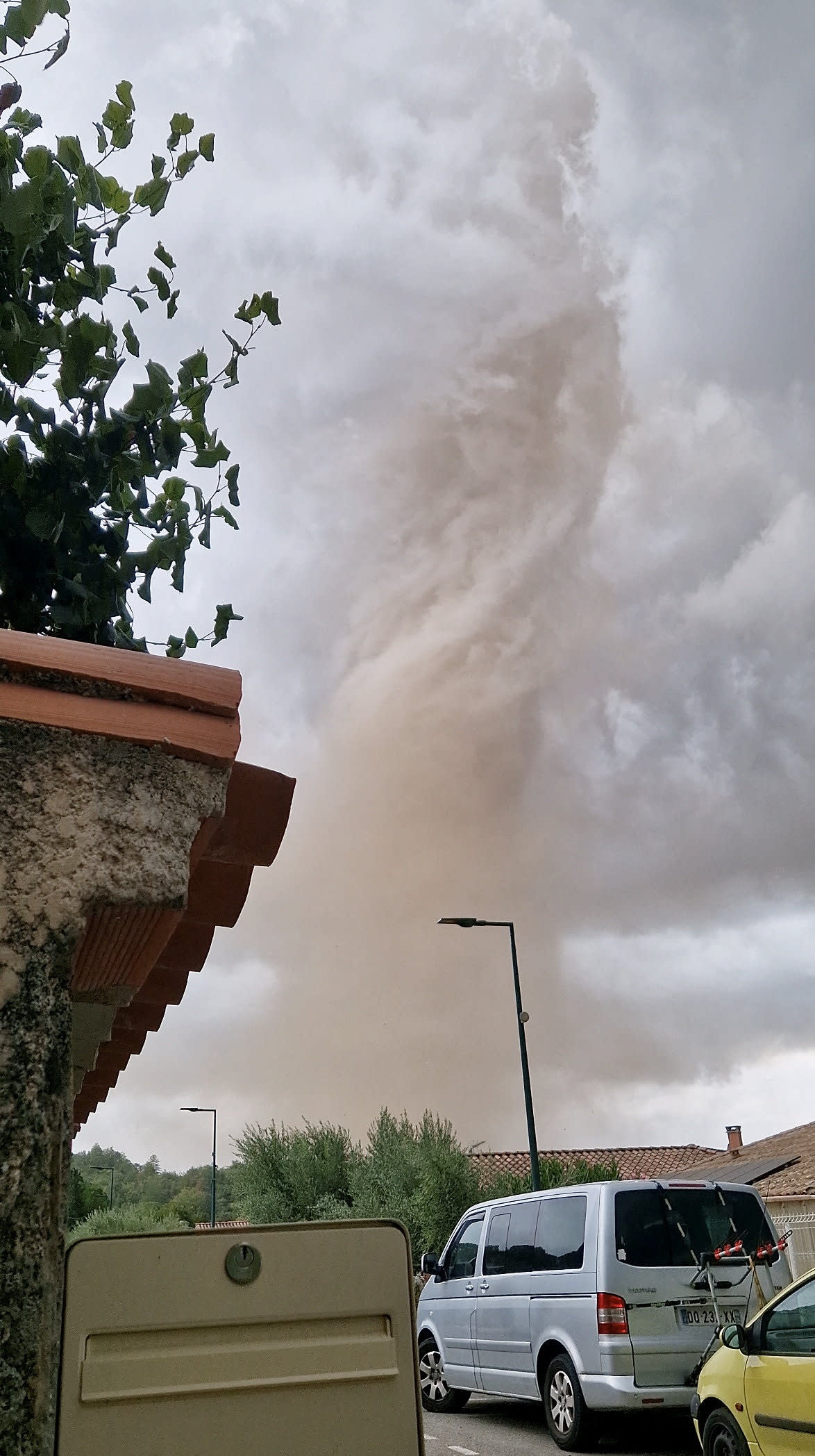 A large tornado moves through Verzeille, France, August 24, 2026, in this screen grab obtained from a social media video.