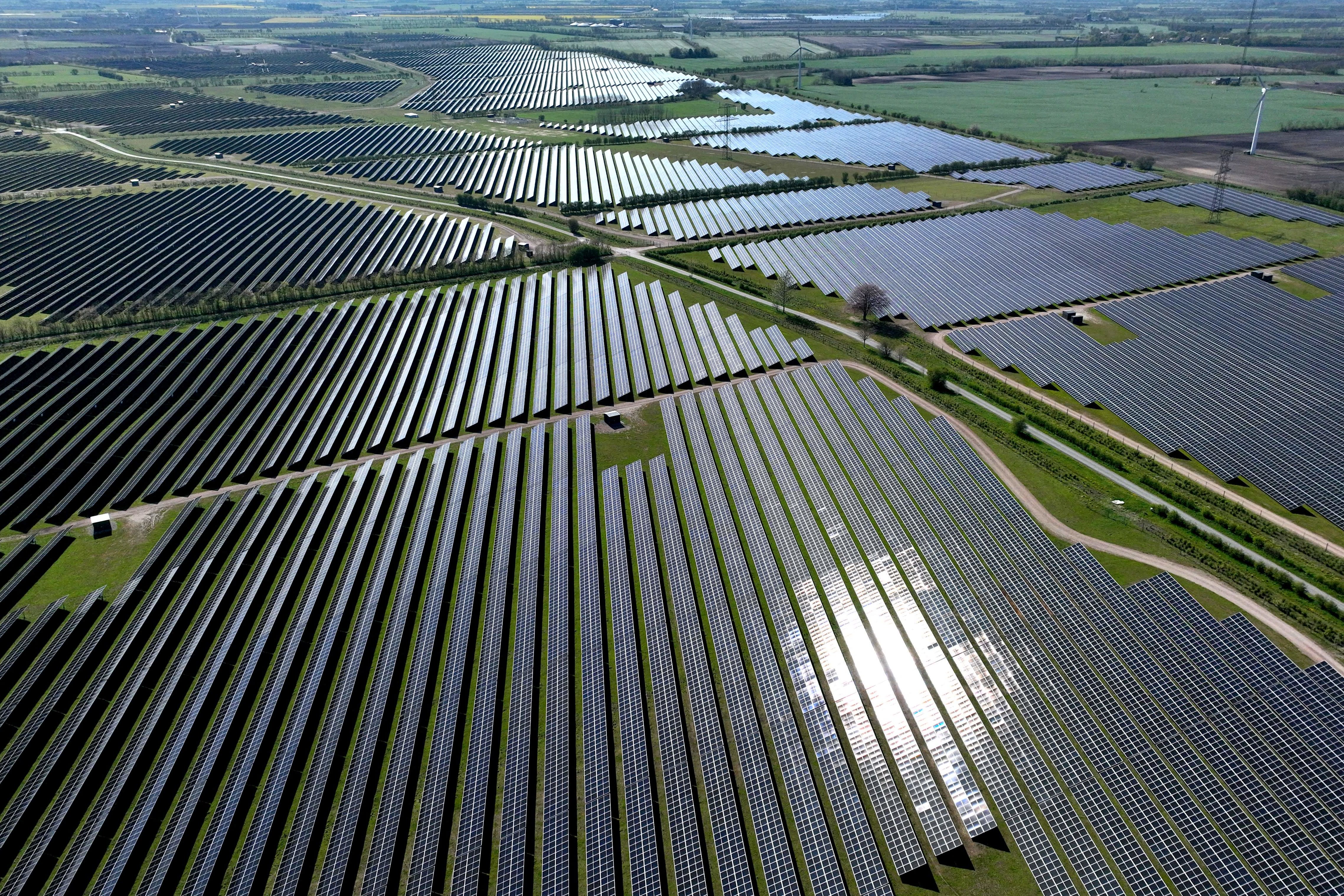 An aerial view shows the photovoltaic (PV) solar panels in the village of Hjolderup, Denmark, on May 8, 2023; illustrative.
