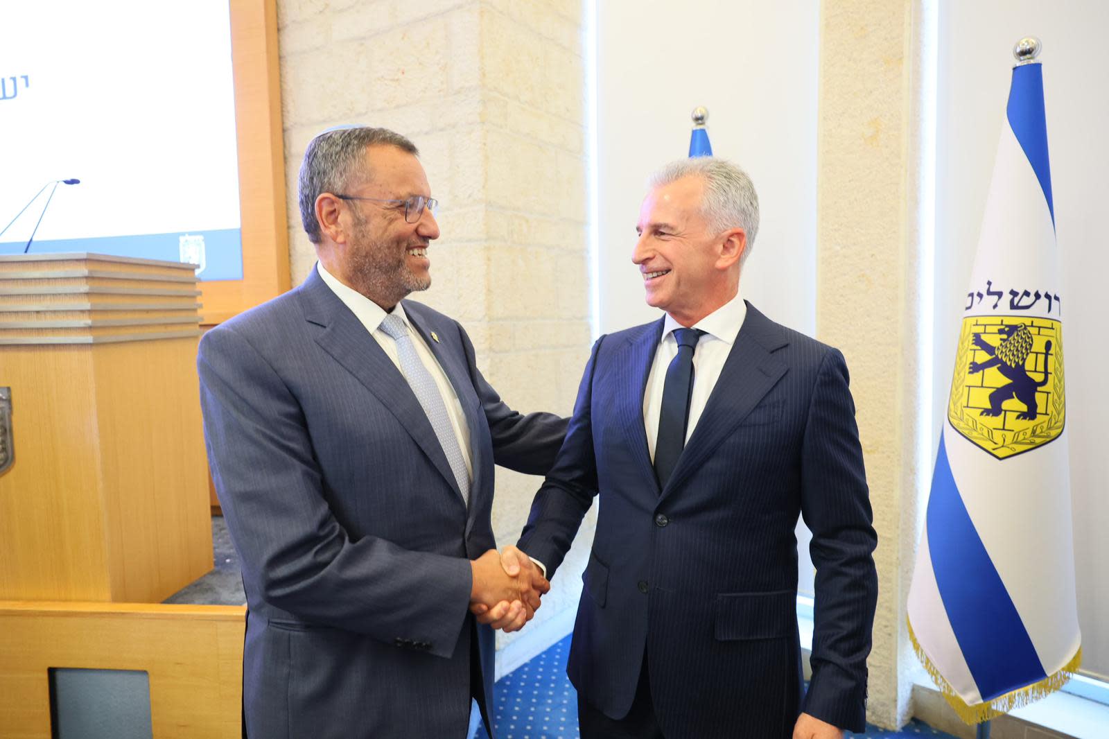 Ex-Mossad chief David Barnea (R) and Jerusalem Mayor Moshe Lion (L) at the Jerusalem Municipality, August 27, 2026.