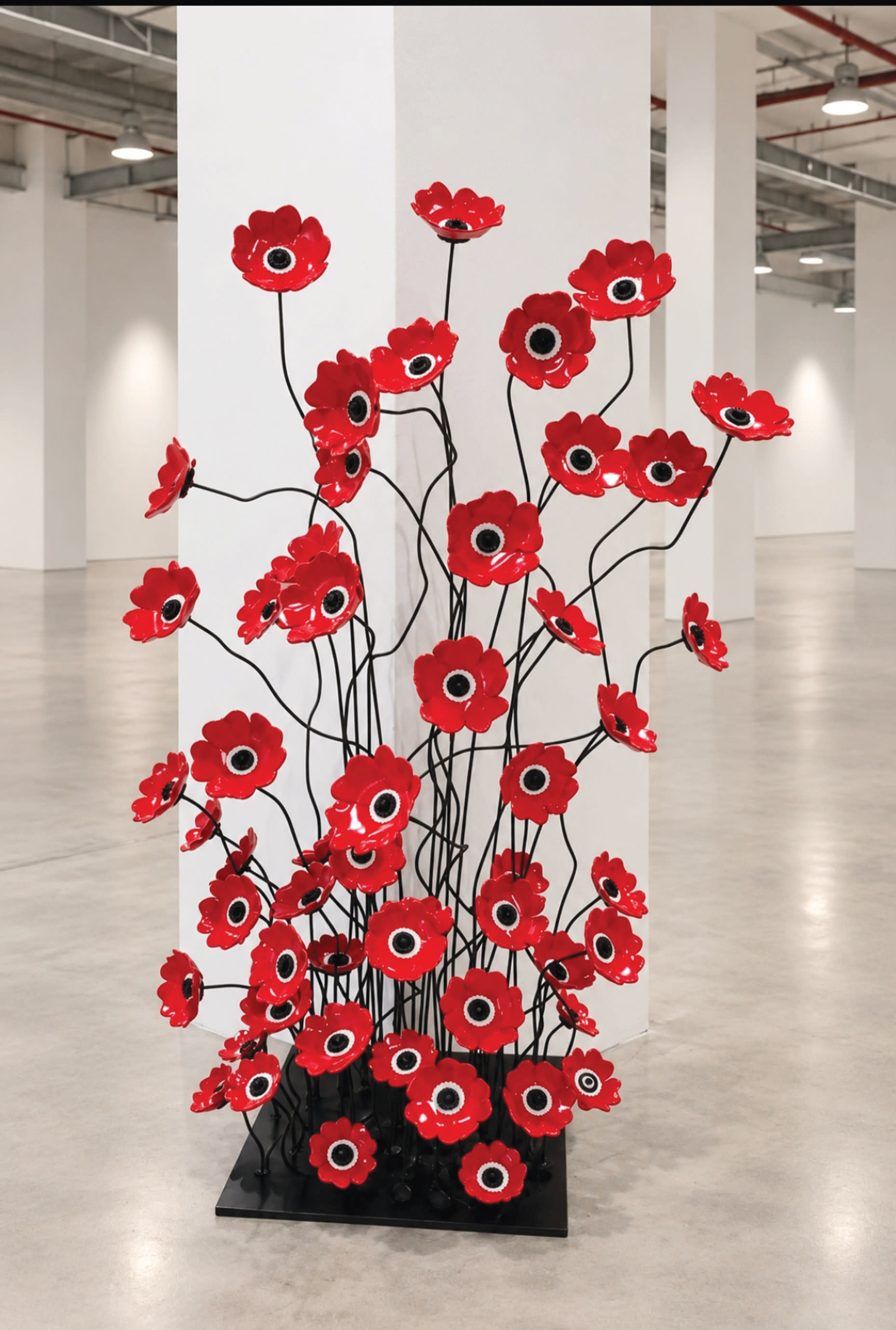 YAFFA SOLOMON’S blood-red Anemones stand sentinel at the site of the Nova Festival.
