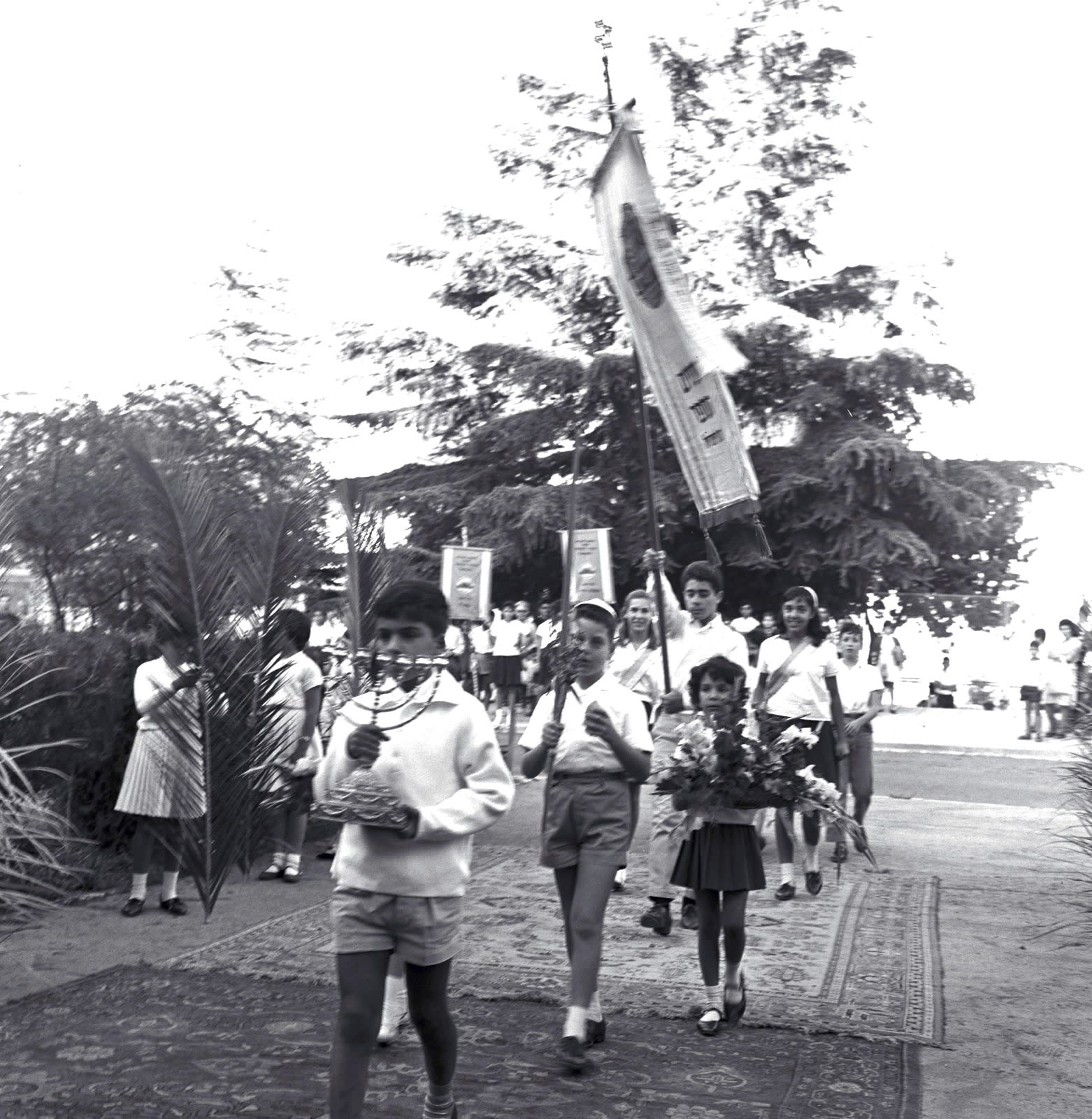Children participating in the Jerusalem Flag Ceremony in Jerusalem, 1964.