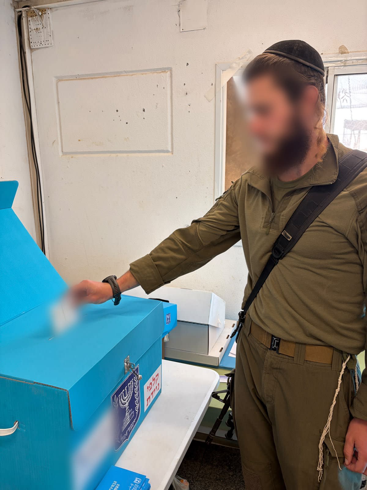 An IDF haredi (ultra-Orthodox) soldier votes in the Knesset elections, published October 21, 2026. (credit: IDF SPOKESPERSON'S UNIT)