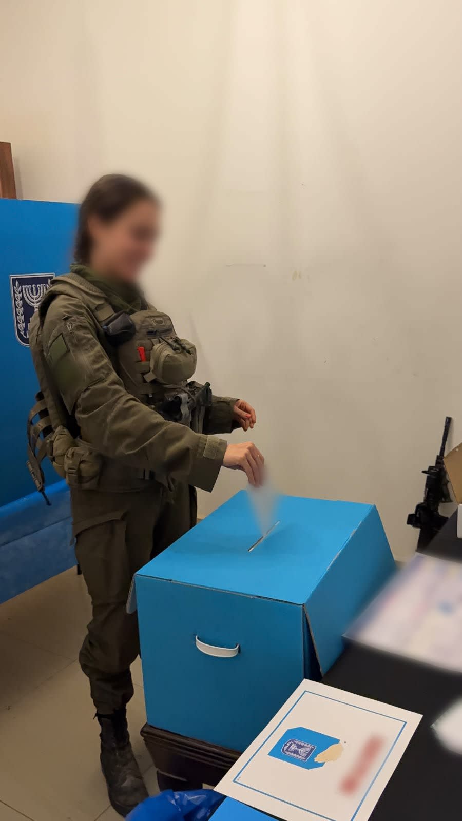 A female IDF soldier submits her vote in the Knesset elections, published October 21, 2026. (credit: IDF SPOKESPERSON'S UNIT)