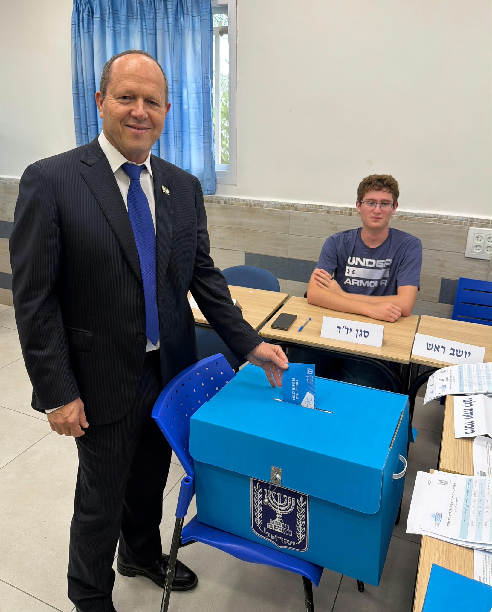 Economy and Industry Minister Nir Barkat casts his vote in 26th Knesset election, October 27, 2026.