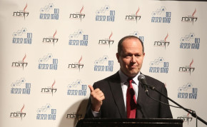 Likud MK Nir Barkat addresses a Kohelet Policy Forum event, February 12, 2020.