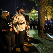  Demonstrators stand facing police officers as people march during a multi-denominational event hosted by the Democratic Socialists of America, IfNotNow Movement and Jewish Voice for Peace calling for a ceasefire in the conflict between Israel and Palestinian Islamist group Hamas, in Washington, DC.