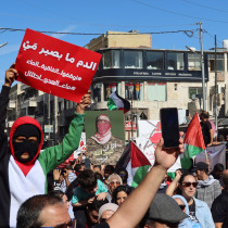  Demonstrators carry flags and banners during a protest in support of Palestinians in Gaza, amid the ongoing conflict between Israel and the Palestinian Islamist group Hamas, in Amman, Jordan November 10, 2023. 