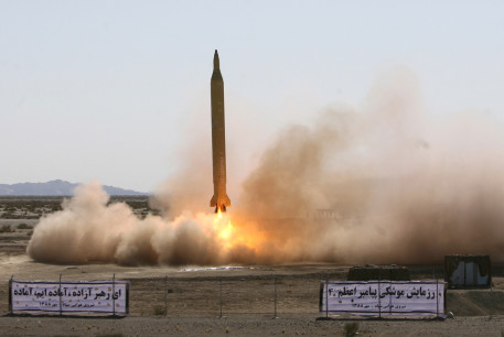 A Ghadr 1 class Shahab 3 long range missile is prepared for launch during a test from an unknown location in central Iran