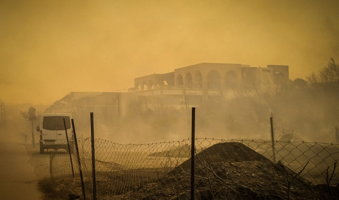 Travelers get away Greek island Rhodes wildfire, thousands left