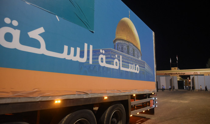 COGAT: Israel can send 100s of aid trucks to Gaza but agencies stuck