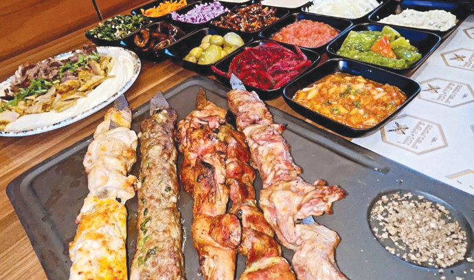 Shifra & Jamil: Enjoying 'Swords of Iron' meat skewers - review - Vimarsana News