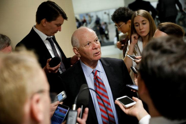 Sen. Ben Cardin (D-MD) speaks with reporters ahead of the party luncheons on Capitol Hill in Washington, U.S. January 23, 2018. (credit: REUTERS/AARON P. BERNSTEIN)