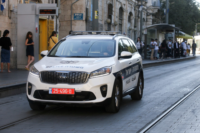 Israel police car (Illustrative) (credit: MARC ISRAEL SELLEM/THE JERUSALEM POST)