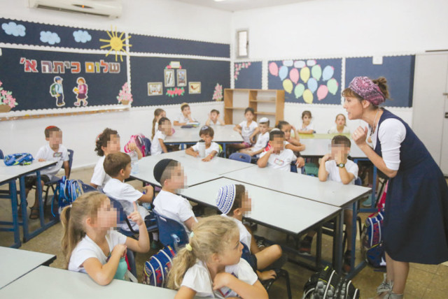 First-grade pupils attend the first day of a school in Jerusalem on September 2 (credit: MARC ISRAEL SELLEM)