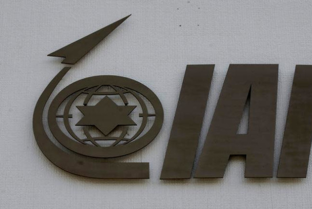The logo of state-owned Israel Aerospace Industries (IAI), the country's biggest defence contractor, is seen at their offices next to Ben Gurion International airport, near Or Yehuda, Israel February 27, 2017. (credit: REUTERS/BAZ RATNER)