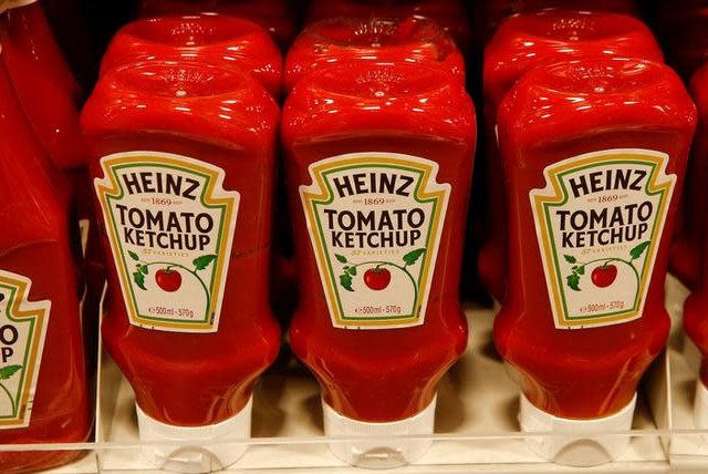 Bottles of Heinz tomato ketchup of U.S. food company Kraft Heinz are offered at a supermarket of Swiss retail group Coop in Zumikon, Switzerland (credit: REUTERS/ARND WIEGMANN)
