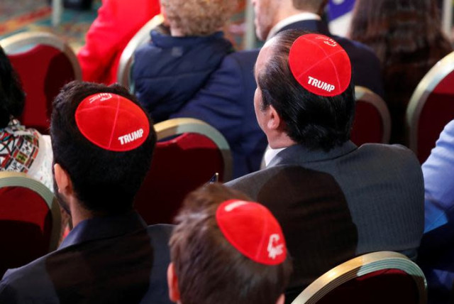 Men wear Trump yarmulkes while waiting for U.S. President Donald Trump to address the Republican Jewish Coalition 2019 Annual Leadership Meeting in Las Vegas (credit: REUTERS/KEVIN LAMARQUE)