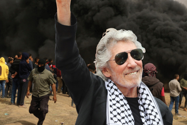Roger Waters, draped with a Palestinian keffiyeh (credit: REUTERS)