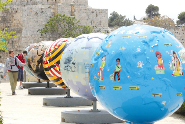 Some of the 'Cool Globes' on display near Jerusalem's Old City in 2013 to raise awareness of climate change.  (credit: MARC ISRAEL SELLEM)