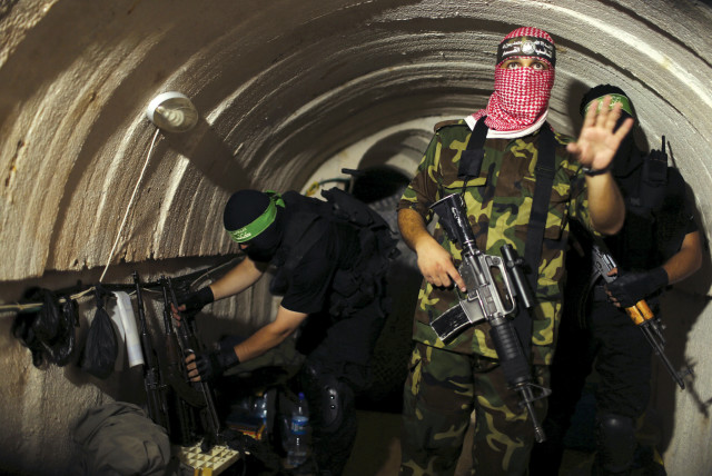 A HAMAS member in a tunnel during the 2014 war (credit: REUTERS)