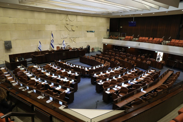 An empty Knesset Plenum  (credit: MARC ISRAEL SELLEM/THE JERUSALEM POST)