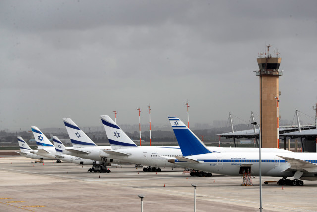 El Al Israel Airlines planes are seen on the tarmac at Ben Gurion International airport in Lod, near Tel Aviv, Israel March 10, 2020 (credit: REUTERS/Ronen Zvulun)