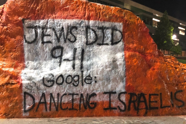 Antisemitism in the United States: Antisemitic graffiti on The Rock landmark at the University of Tennessee in Knoxville, blaming Jews for the September 11, 2001 terrorist attacks, September, 2019 (credit: ADL)