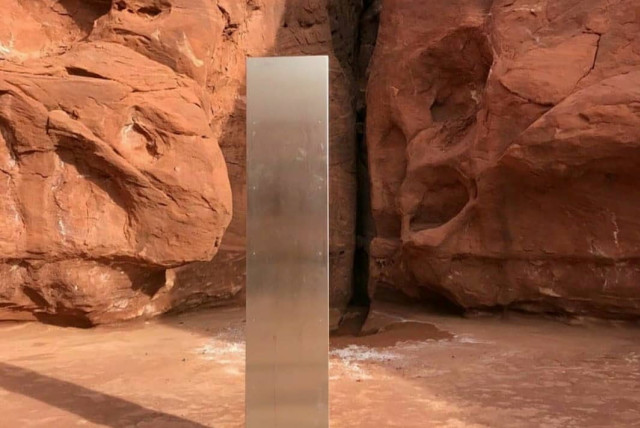 A metal monolith is pictured in a remote area of Red Rock Country in Utah, US November 18, 2020. (credit: UTAH DEPARTMENT OF PUBLIC SAFETY VIA REUTERS)